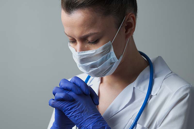 a doctor showing compassion to a patient